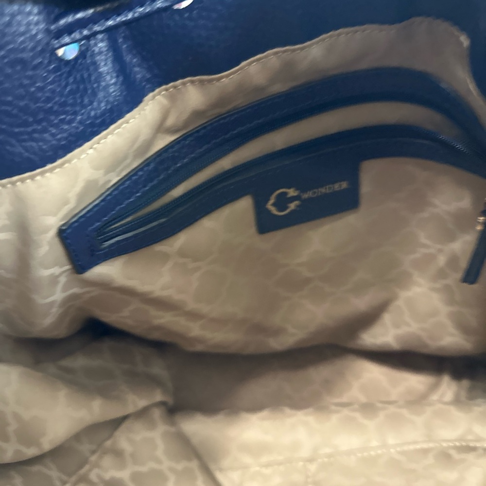 C Wonder Blue Pebbled Leather Drawstring Bucket Bag with Gold Logo - Picture 3 of 7